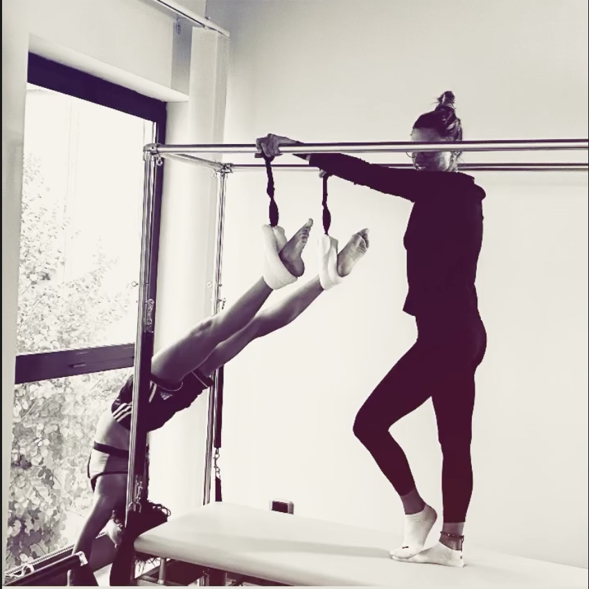 Studio Pilates Grosseto — Giulia Fognani durante una lezione su Cadillac